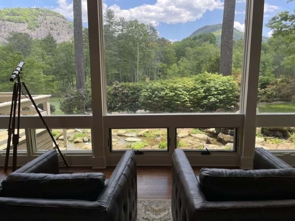 Great room view of 11th hole of High Hampton course & Rock Mountain.