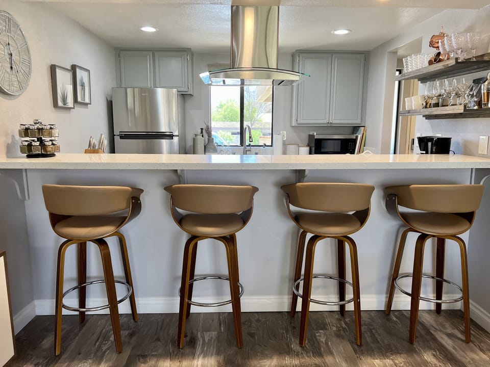 New comfy mid century bar stools. Your family and friends can watch you cook! 🍽