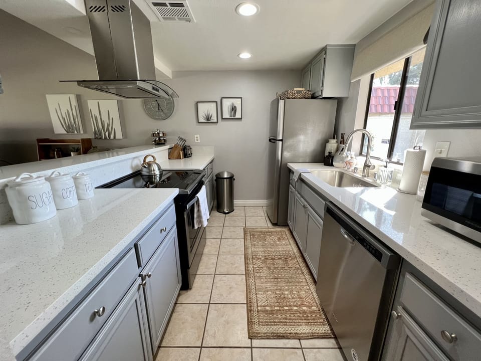 Fully equipped kitchen with stainless steel appliances