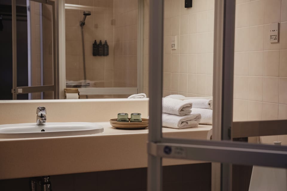 Double Room (Compact) | Bathroom | Shower, towels