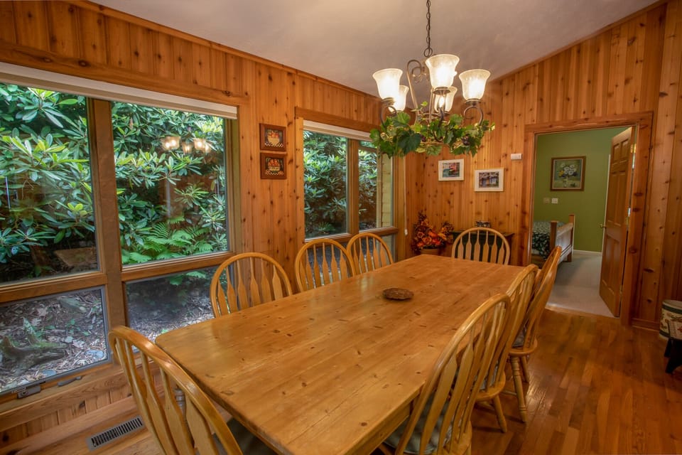 Long Banquet-style Dining Table seats ten to twelve guests comfortably (additional chairs not pictured)