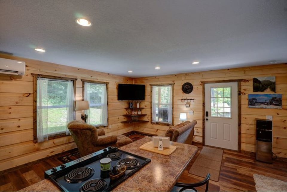 Signature Cabin, Mountain View | Living area | 50-inch TV with cable channels