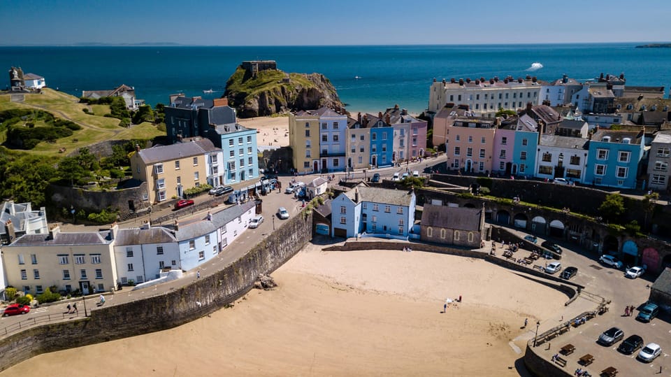 Looking down on the golden sands of Tenby and its pastel coloured houses