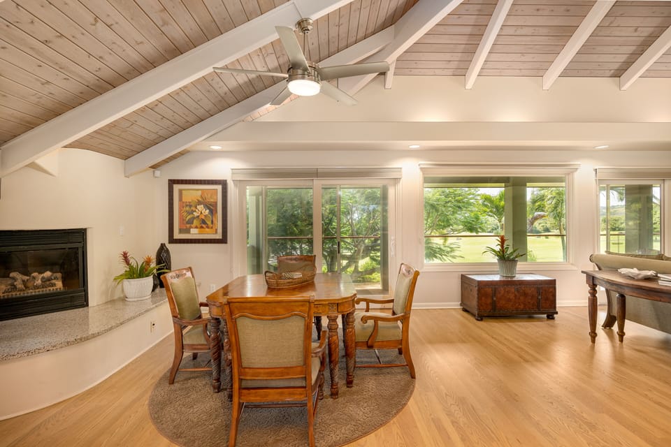 Great Room features a games table, fire place and a wraparound lanai.