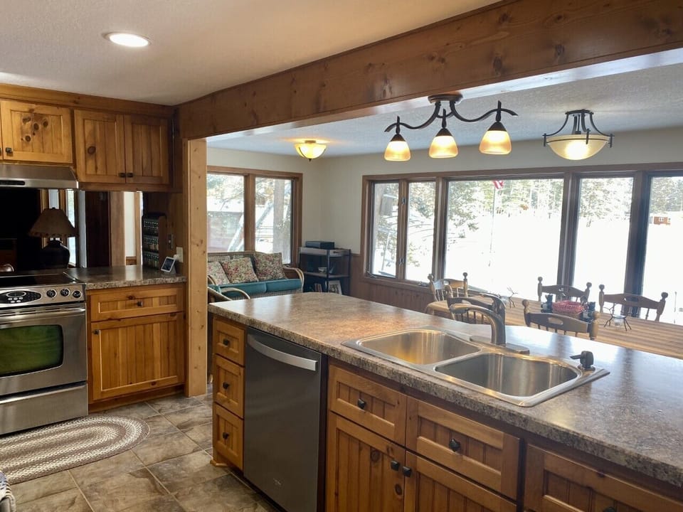 Centrally located and open kitchen.  High end appliances and view of the lake.