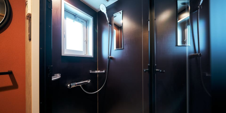 Free toiletries, hair dryer, slippers, electronic bidet