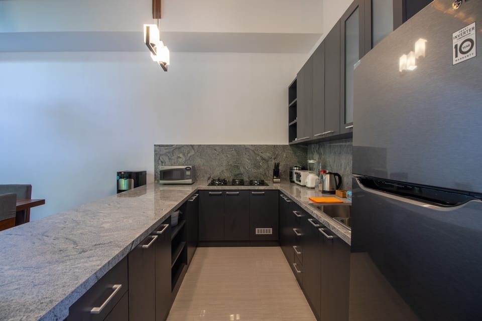 Villa | Private kitchen | Electric kettle, paper towels