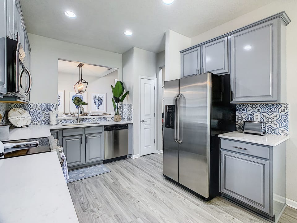 Quartz Countertops And Stainless Steel Appliances