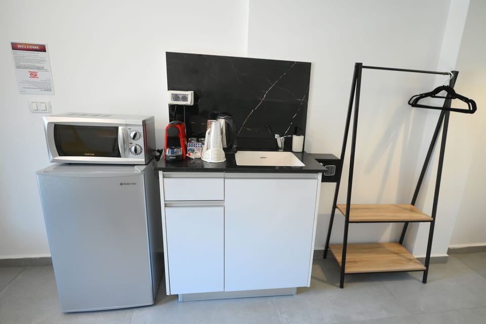Full-size fridge, microwave, stovetop, espresso maker