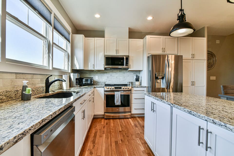 Kitchen is fully equipped and features an induction cook top range
