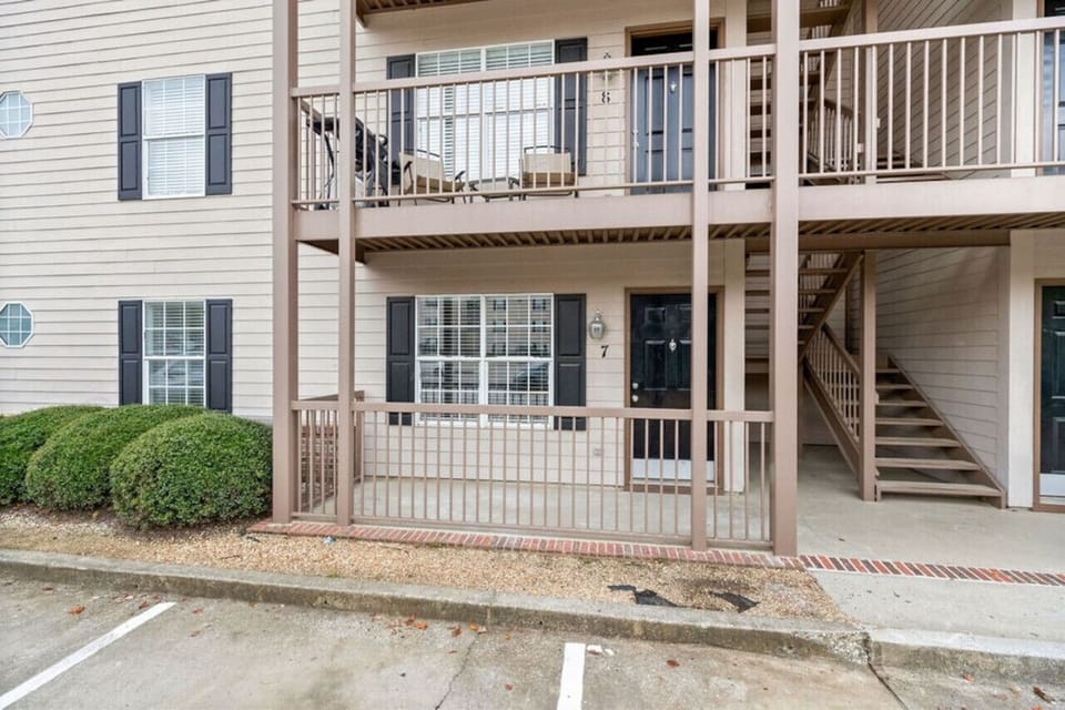 Downstairs unit with small front porch