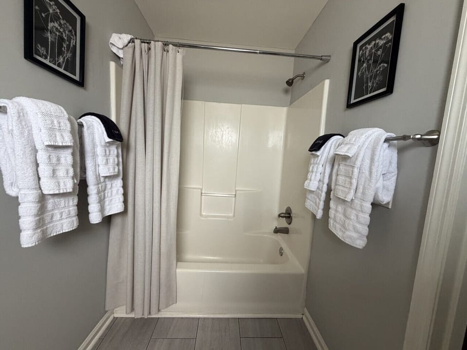 Clean and modern bathroom with fresh towels and updated finishes