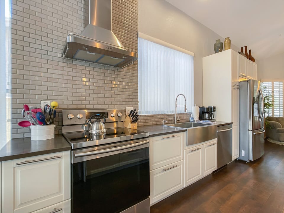 Kitchen as seen from the dining room table.