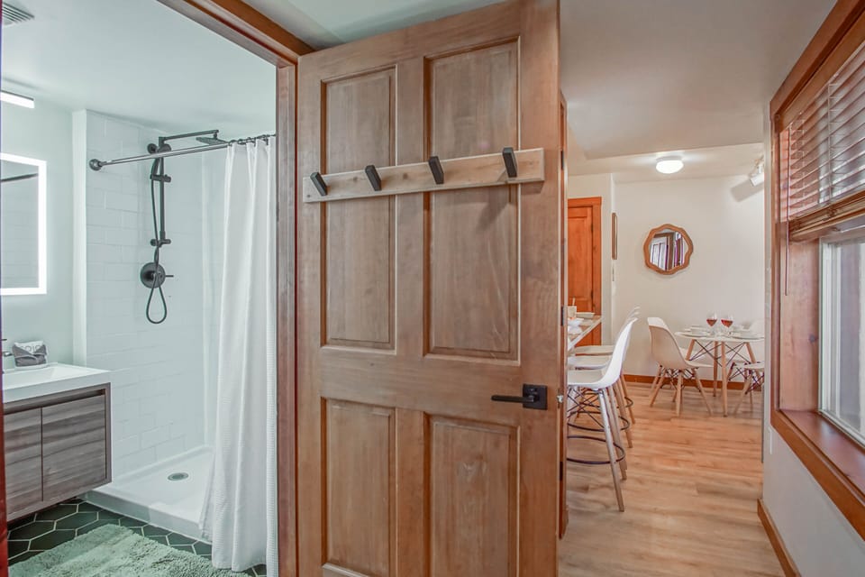 Bathroom off the hallway across from the bunk beds, just down the hall from the bedroom