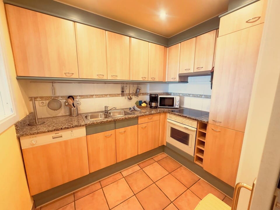 Kitchen, Kitchen Appliance, Countertop, Flooring, Cabinetry, Major Appliance, Wood, Floor, Interior Design, Kitchen Sink