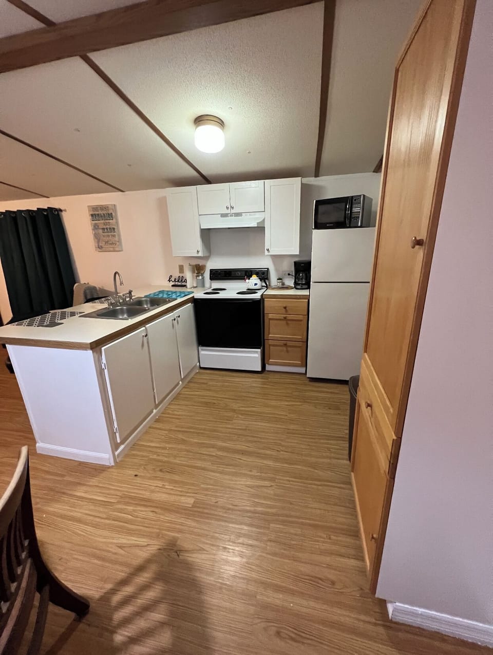 Kitchen refrig. micro. (Left of stove light) right is washer/dryer sliding door 