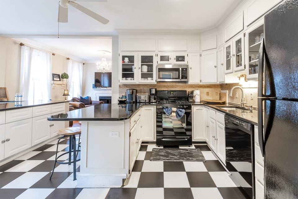 The kitchen is equipped with big and small appliances to make your stay feel like home.