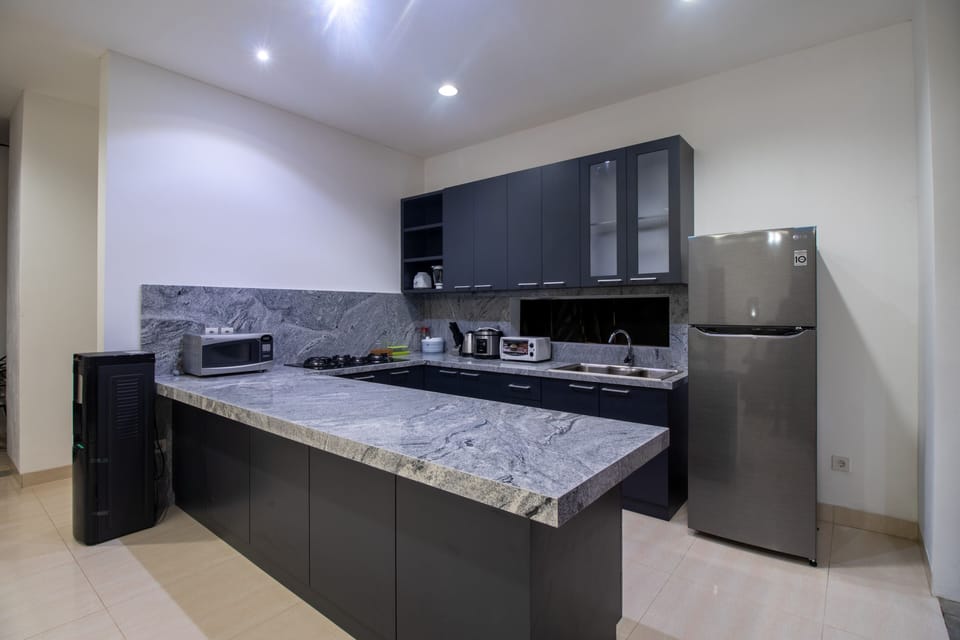 Villa | Private kitchen | Fridge, microwave, stovetop, electric kettle