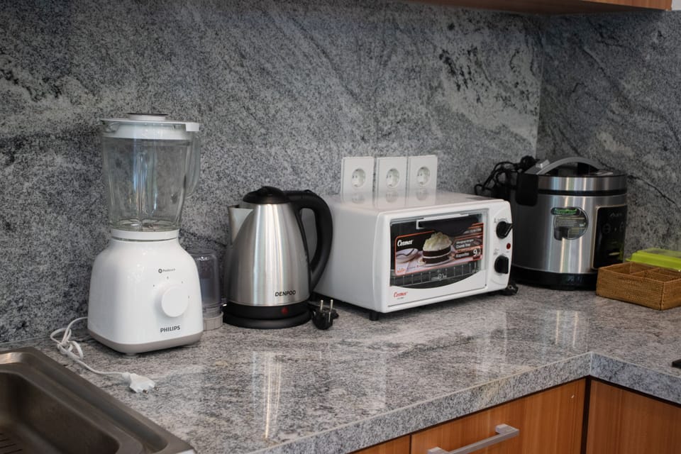 Villa | Private kitchen | Fridge, microwave, stovetop, electric kettle