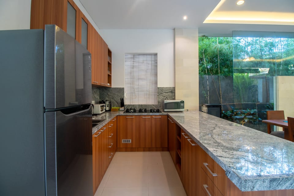 Villa | Private kitchen | Fridge, microwave, stovetop, electric kettle
