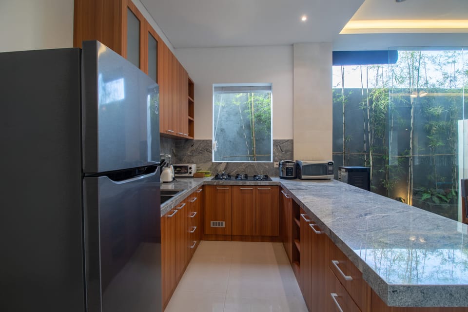 Villa | Private kitchen | Full-size fridge, microwave, stovetop, electric kettle
