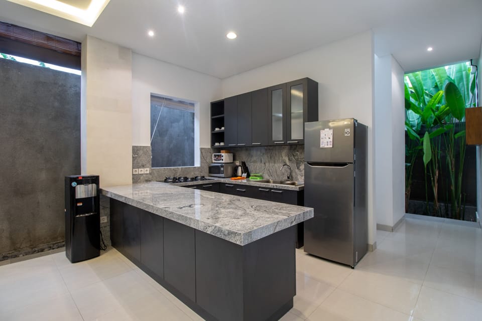 Villa | Private kitchenette | Electric kettle, dining tables