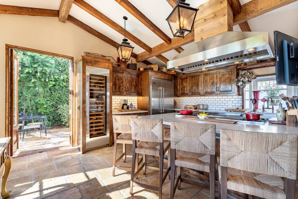 Our Kitchen opens up to BBQ and Outdoor Kitchen