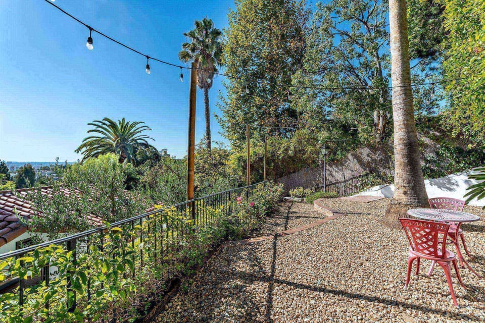 Enjoy our Rose Garden in the Upper Level courtyard. On a clear day - you can see the Ocean!