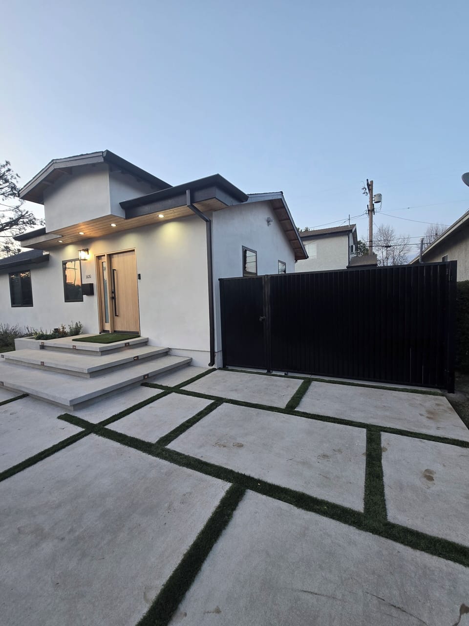 The guest house is situated behind the main house