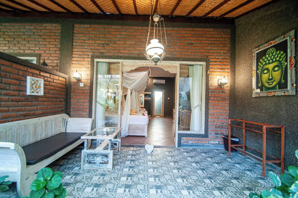 Family Quadruple Room, Garden View | Terrace/patio