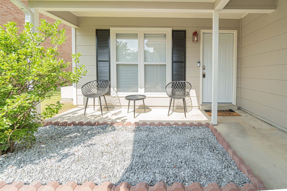 Pour a glass of wine and relax on the porch at the end of each day