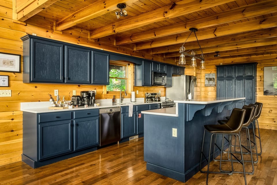 Enjoy our fully equipped kitchen with a breakfast bar, complete with coffee machines, toaster, blender, and waffle maker, ensuring a delightful dining experience for the whole family.