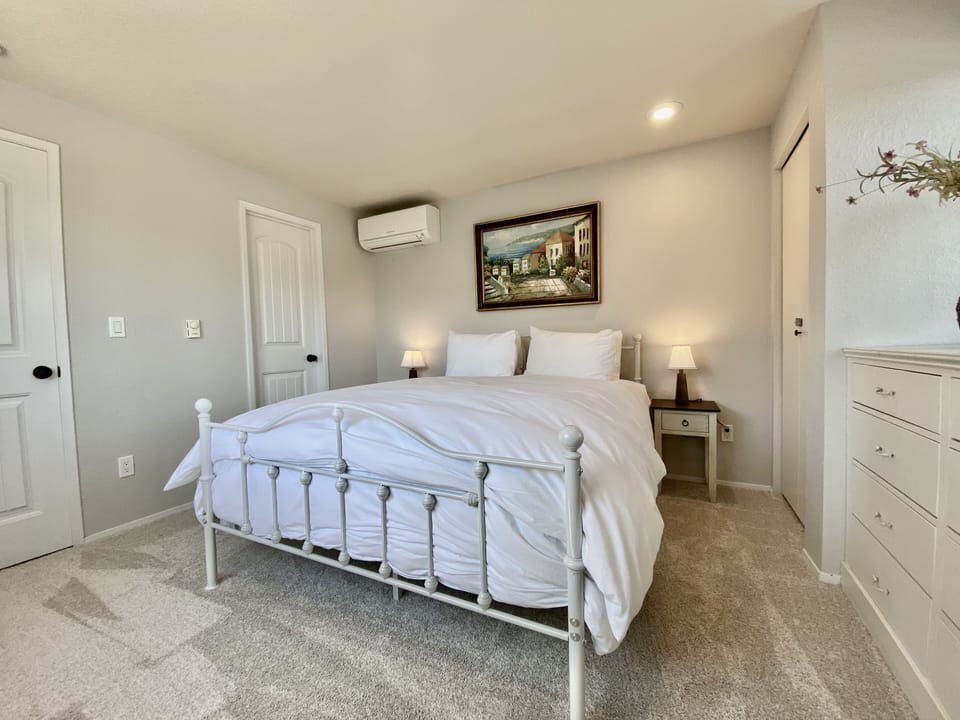 Bedroom #1 with queen bed and ensuite full bathroom (upstairs)