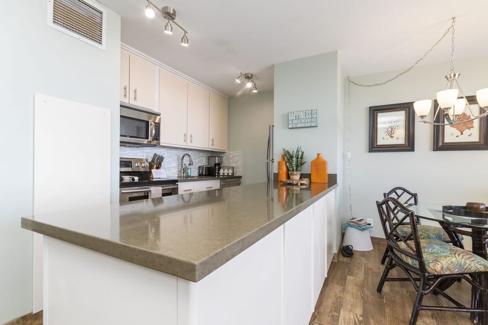 Picture yourself preparing meals at sleek countertops, gathering around the dining table, and making this bright, open-concept kitchen your home away from home.