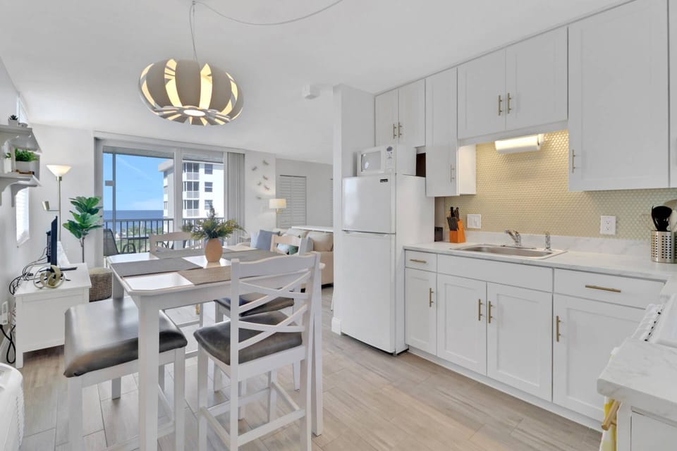 Enjoy your meals or a friendly card game at the dining table for 4 in the eat-in kitchen.