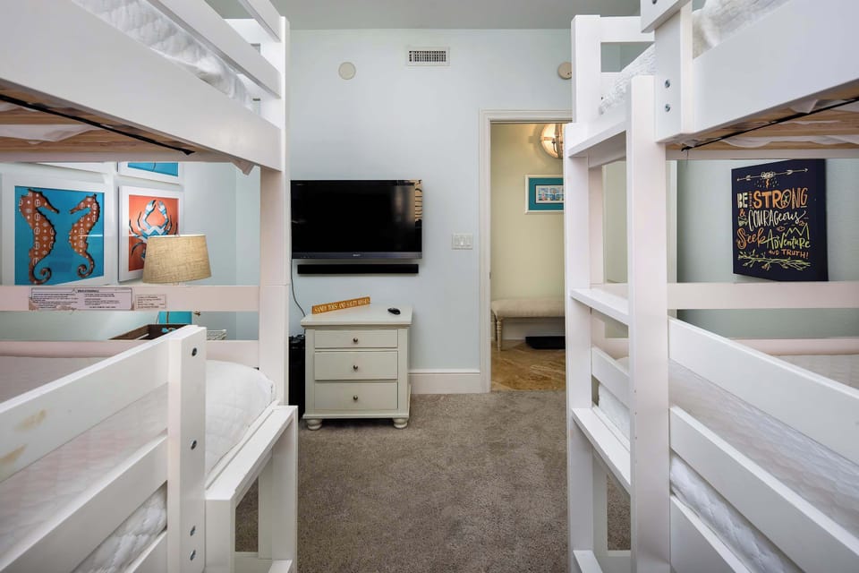 Bunk bed room with TV
