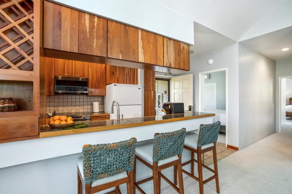 The bar area allows for entertainment while cooking up a feast
