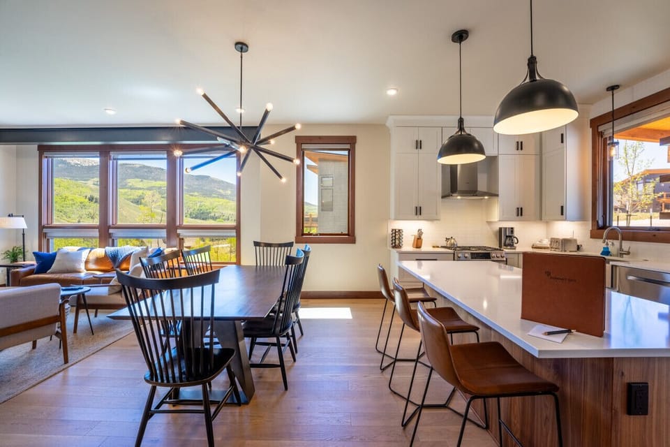 Open concept living, dining and kitchen areas
