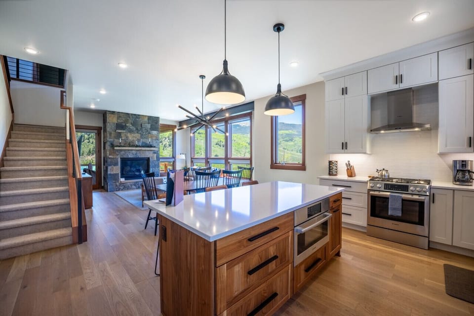 Open concept living, dining and kitchen areas