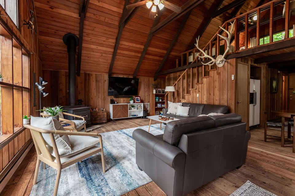 Enjoy 65' in smart tv, sound bar, board games, puzzles, books, and ample seating