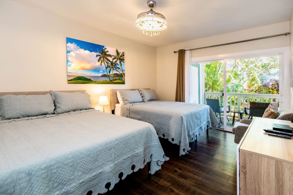 Master Bedroom with Two Queen Beds and Art: Kalapaki Sunrise 1