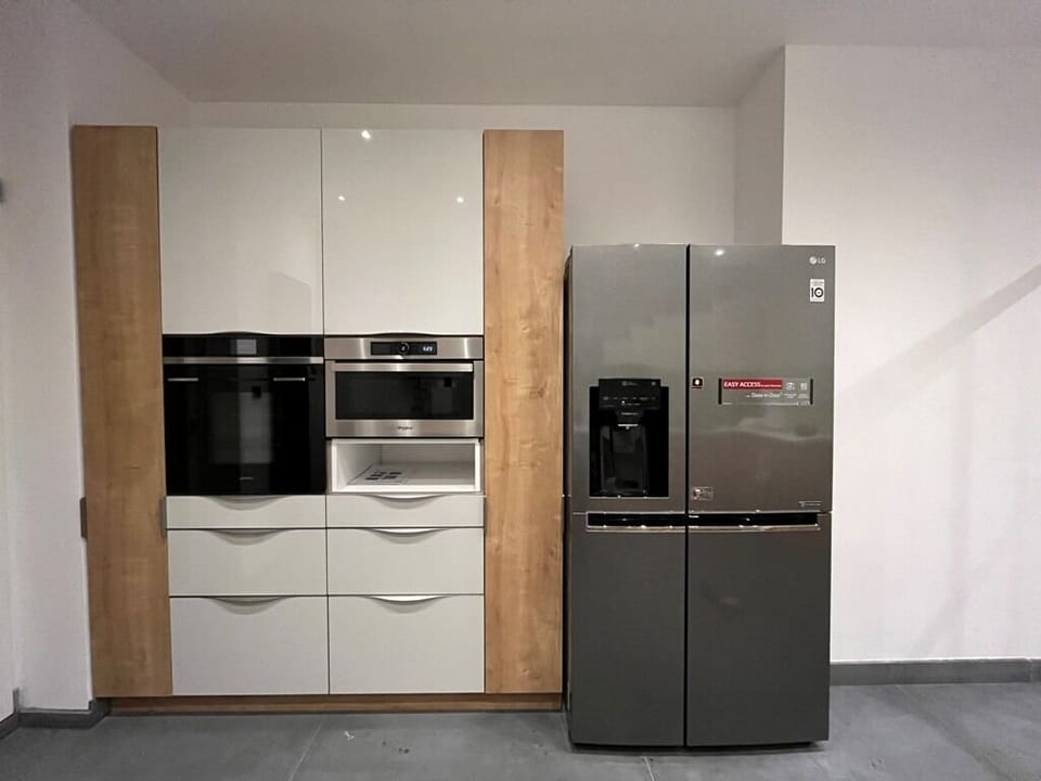 Kitchen with Oven, Microwace and American Style Fridge Freezer with ice maker