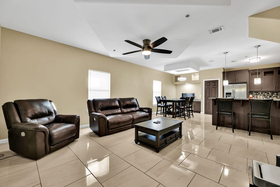 Powered leather recliners and lift top coffee table