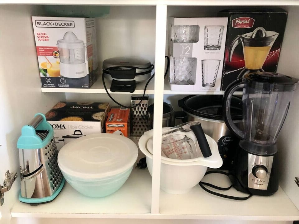 Our kitchen is FULLY STOCKED, including coffee maker, coffee grinder, frother, toaster, blender, citrus juicer, rice cooker, crocpot, mixer, spices, condiments and so much more!
