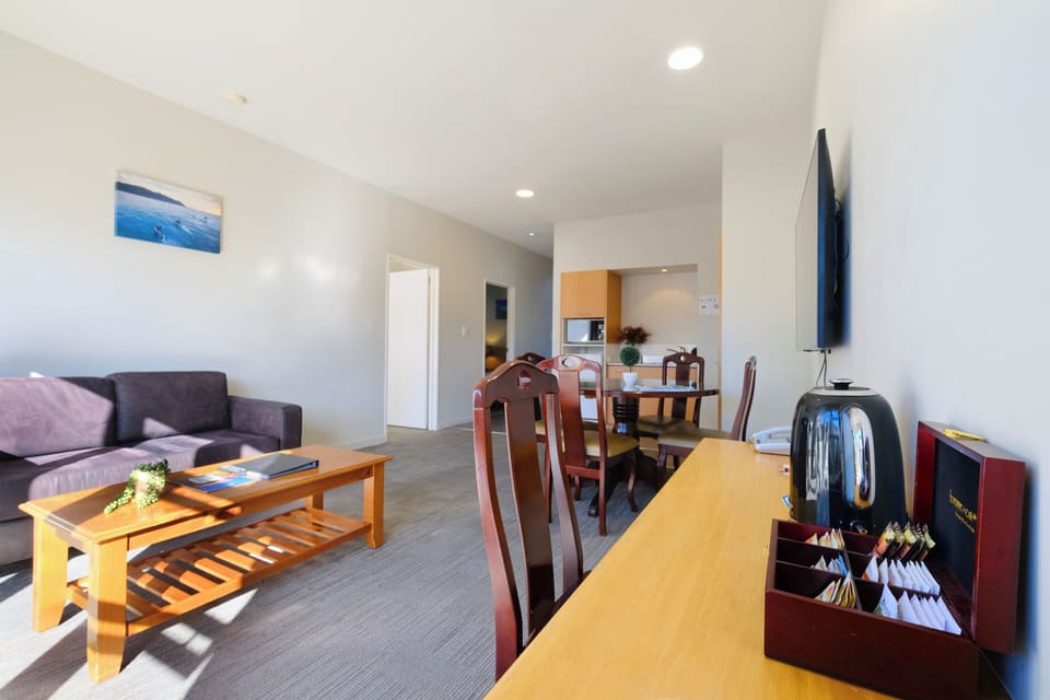 Two Bedroom Suite | Living area | 42-inch Smart TV with digital channels