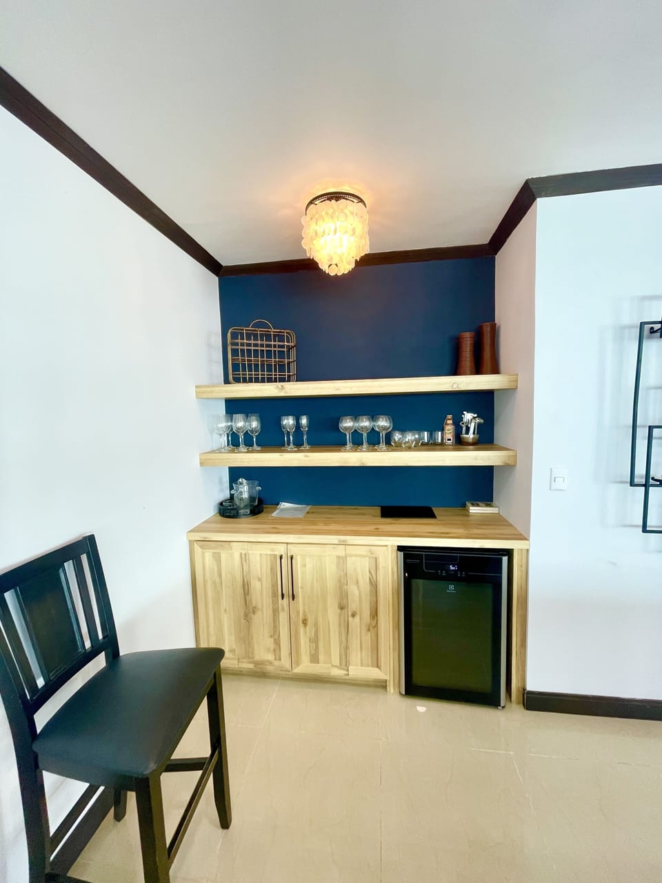 bar area with mini fridge
