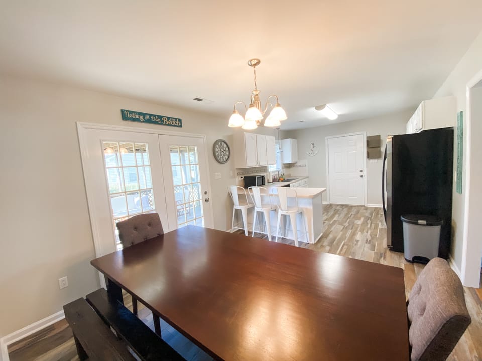 Dining room and kitchen with island seating