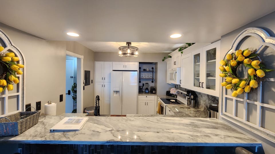 Brand new stocked kitchen with drip style coffee maker