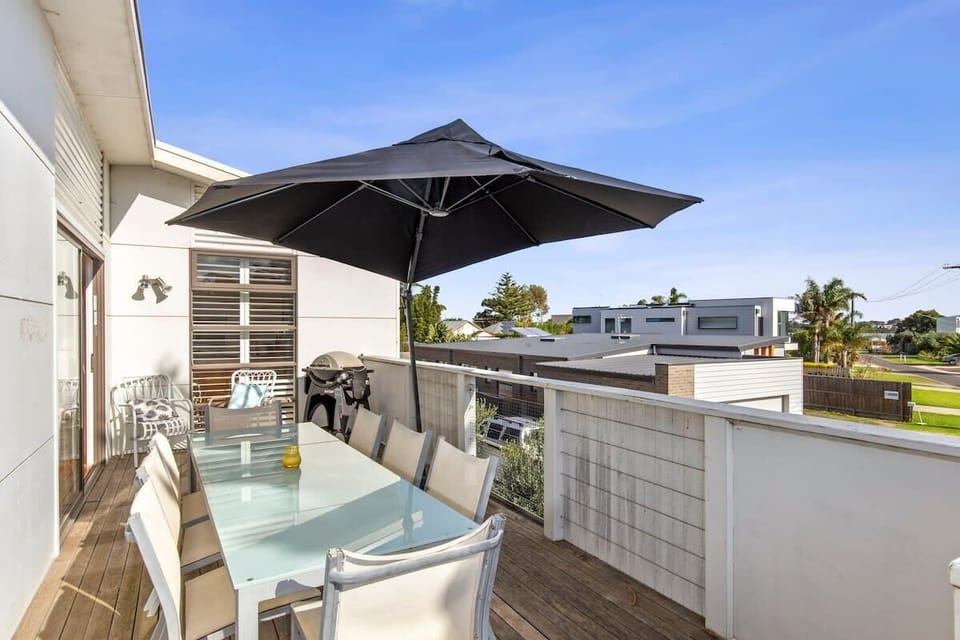  Take in the river vista and breathtaking sunsets from the outdoor dining table, with a Weber Q for casual meals.
