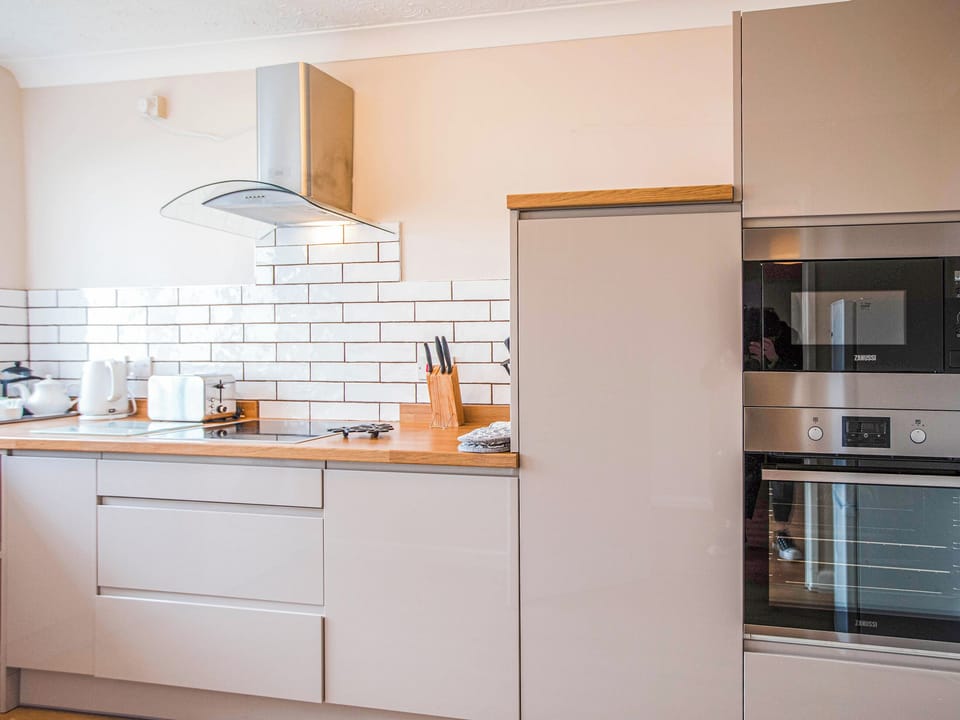 Kitchen | Bosun&rsquo;s Cabin - Celtic Haven Resort, Lydstep, near Tenby